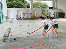Floorball scoring a goal.jpg